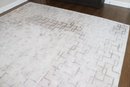 White And Beige Area Rug