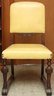 Trio Of Carved Oak Chairs With Yellow Leather Cushions