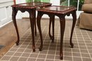 Two Mahogany Carved Nesting Tables