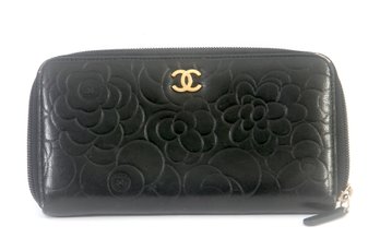 Chanel  Lambskin Camellia Embossed Large Zip Around Gusset Wallet