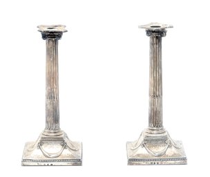 Pair Of Silver Hallmarked Weighted Candlesticks