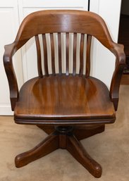Walnut Swivel Arm Chair