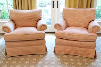 Two Upholstered Swivel-Bottom Armchairs With Rolled Arms