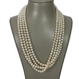 Long Strand Of Faux Opera Pearl Necklace