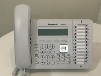 Seven Panasonic Telephones - Model KX-DT543X (4 White / 3 Black)
