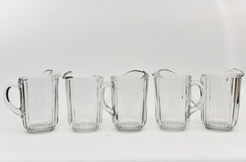Five Glass Pitchers