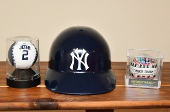 Yankees Baseballs And Helmet
