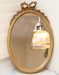 Gold Framed Mirror With Bow Finial