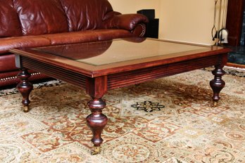 Ethan Allen Cane And Glass Top Coffee Table On Wheels