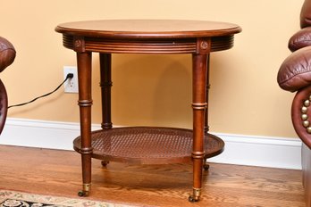 Ethan Allen Two Tier Rattan Side Table With Brass Wheels