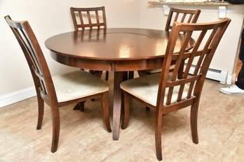 Round Dining Table And Chairs