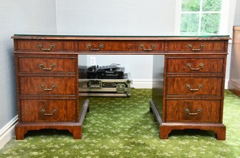 English Leather Top Flame Mahogany Desk With Glass Top