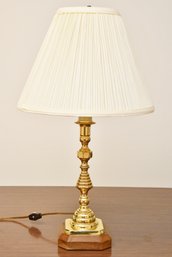 Brass Lamp On Wooden Base
