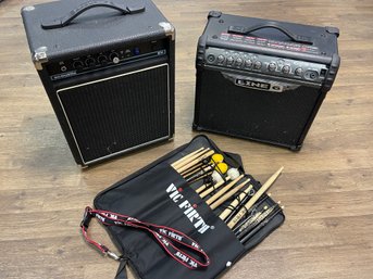 Two Amps And Drumsticks