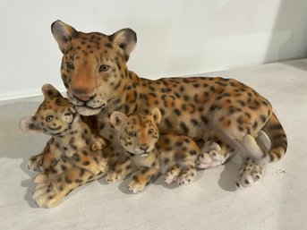 Mother Leopard With Cubs