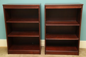 Pair Of Bookcases With Adjustable Shelves And Gold Inlay