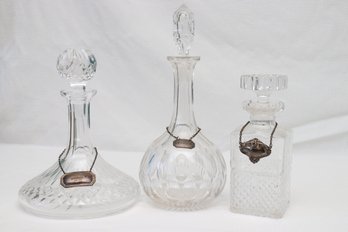 Eclectic Collection Of  3 Crystal Decanters