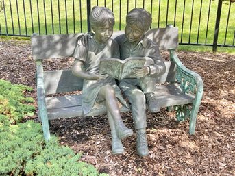 Boy And Girl Seated On Bench Reading A Book Outdoor Bronze Statue  In Style Of Leonardo Rossi