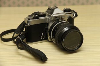 Vintage Nikon FE SLR Camera Ands Lens