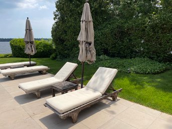 Weathered Teak Lounge Chairs With Umbrella And Side Table