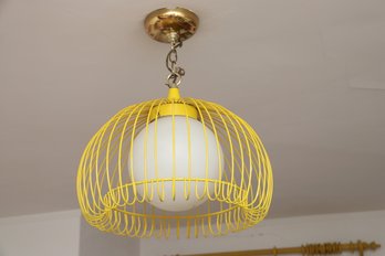 Mid Century Yellow Cage Light With White Glass Bulb