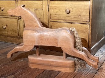Carved Wooden Horse Sculpture With Straw Tail