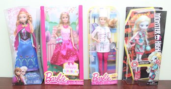 Four Barbie Dolls