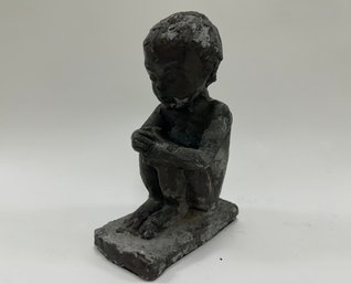 Signed Sitting Boy Sculpture