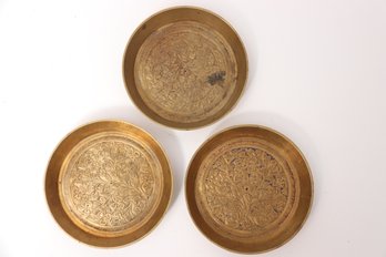 Three Brass Relief Coasters