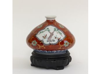 Chinese Vase On Wooden Base