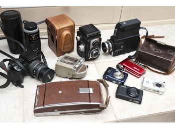 Lot Of Vintage Cameras And Lenses.