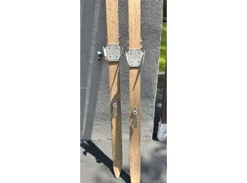 Pair Of Wooden Snowshoes And A Pair Of Wooden Skis