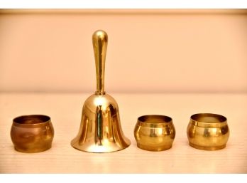 Brass Bell And Three Brass Napkin Ring Holder