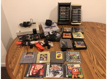 Nintendo And Super Nintendo Consoles With Games And Controllers