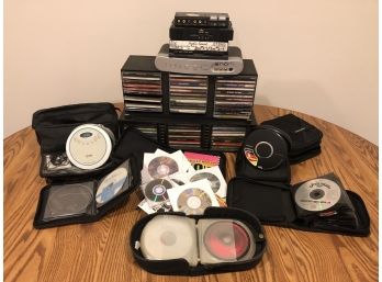 CD Lot With Two Portable CD Players And CD's With Cases