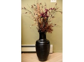 Black Vase With Artificial Flowers