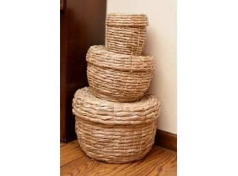 Stack Of Covered Wicker Baskets