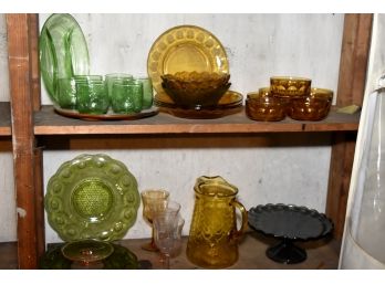 Collection Of Vintage Colored Glass In Basement
