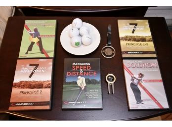 Assortment Of Golf Related Videos And Accessories