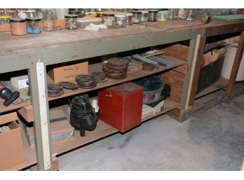 Bottom Of Work Bench Including Antique Weight Plates
