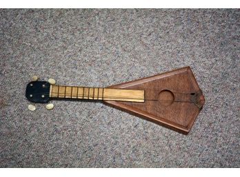 Old Small Guitar ???