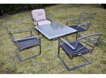 Cast Aluminum Seating Area With Table And Cushions