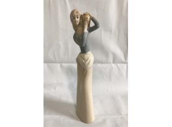 Ceramic Woman Holding Jar Statue