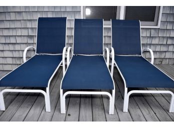 Three Blue Chaise Lounge Chairs