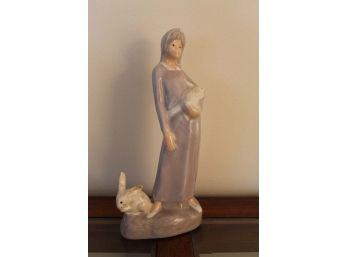 Woman With Rabbits Figurine