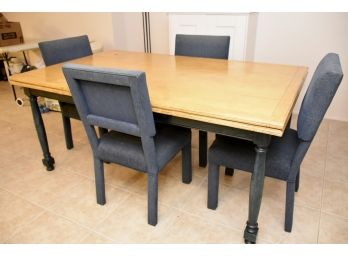 Table With Four Upholstered Chairs