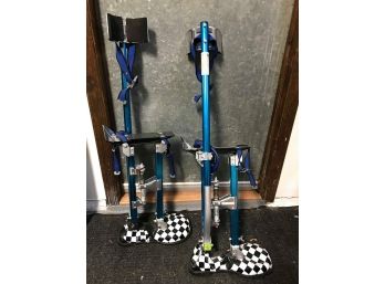 Pair Of Stilts W/ Checkered Shoes