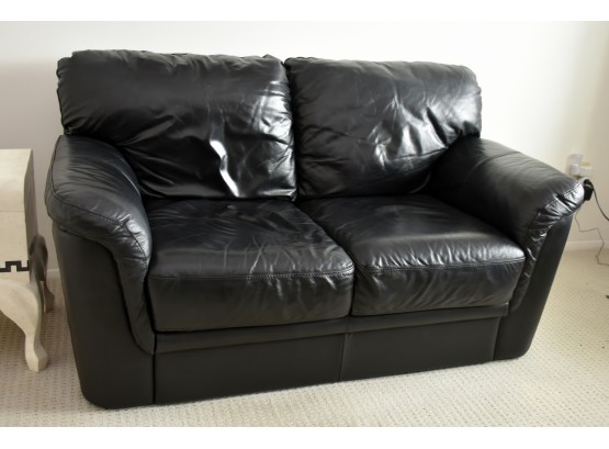Black Leather Loveseat 62 X 36 X 35 Located On Second Floor