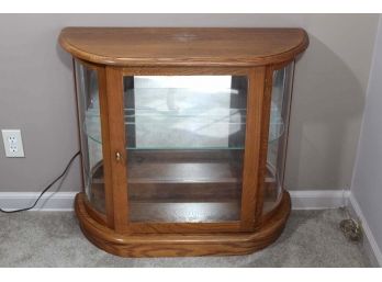 Lighted Curio Console With Mirrored Back