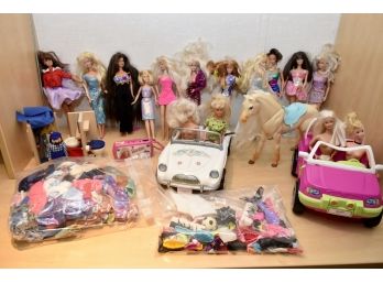 Assortment Of Vintage Barbies And Accessories